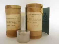 Two Royal Air Force instructional film strips, each contained within an aluminium canister marked