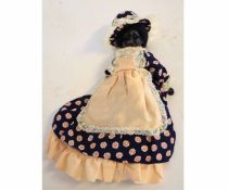 Early 20th century German black bisque headed doll, marked “Germany KI”, modern clothing, 30cms tall
