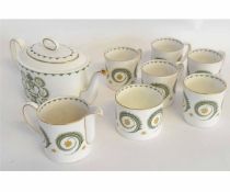 Part set of Susie Cooper Assyrian motif tea wares comprising five cups, sugar bowl, cream jug and