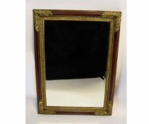 Reproduction mahogany and parcel gilded wall mirror, 110 x 79cms