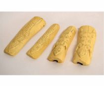 Group of four carved ivory sections (pre-1947) with raised and engraved decoration of fish and