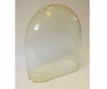 Large clear glass dome (loss to base rim), height 61cms, width 50 1/2cms, together with two black