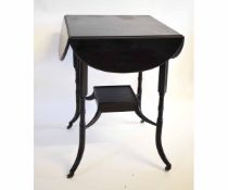 Late 19th century ebonised occasional table with four drop flaps, 46cms wide