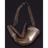 Middle Eastern metal mounted and horn shot/powder flask of curved form with pull off cover and