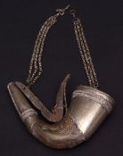 Middle Eastern metal mounted and horn shot/powder flask of curved form with pull off cover and