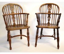 Two yew and oak/elm stick back solid seat armchairs with crinoline stretchers