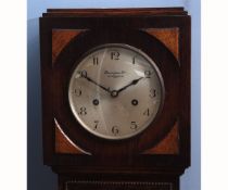 Mid-20th century oak cased floor standing clock, the square hood with stepped pediment and