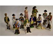 Group of eleven 20th century porcelain figures of Napoleonic period military persons and others,