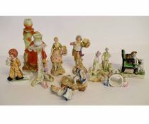 Collection of ten mainly late 19th/early 20th century small porcelain figures, napkin ring and dog