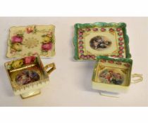 Pair of Vienna style cups and saucers decorated with classical scenes within rose and floral borders