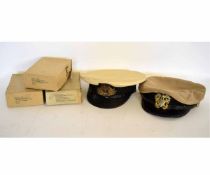 Mixed Lot: British Naval Officer's peaked cap together with further American Naval issue peaked cap,