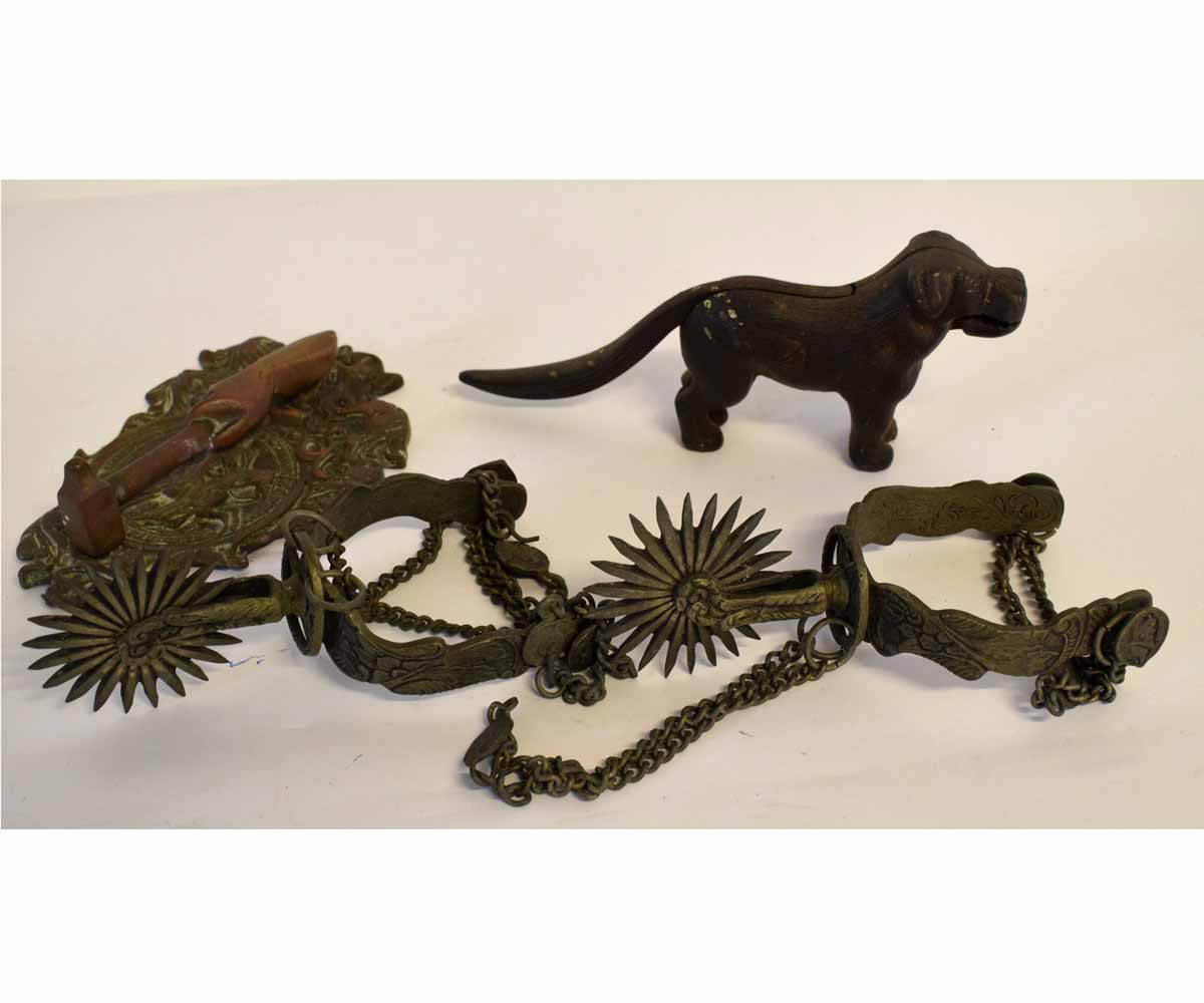 Pair of reproduction spurs, dog nutcracker and other metal ware