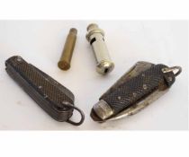 Mixed Lot: two various British folding clasp knives, one dated 1941, together with a whistle (a/f)