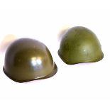 Mixed Lot: two green finished steel helmets, including Austrian M1 and Russian SSH40 examples,
