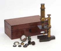 Late 19th/early 20th century French patinated and lacquered brass monocular microscope, E Hartnack