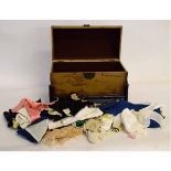Modern trunk containing various doll's clothing etc