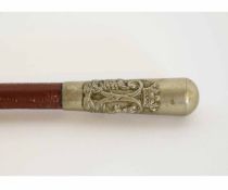 Base metal capped swagger stick bearing the regimental badge for the Argyll & Sutherland regiment,