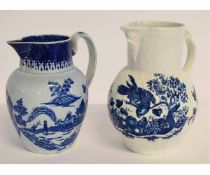 Worcester mask jug with parrot pecking fruit pattern, together with a pearlware jug with boy on a