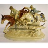 Show jumping group of two jumpers over a fence, the base impressed GDR, length 25cms
