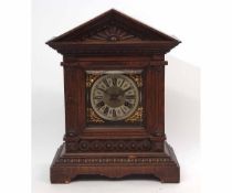 Early 20th century German oak cased mantel clock, Junghans, the architectural case with hinged and