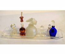 Glass tray containing six various 20th century small lidded glass scent bottles (7)