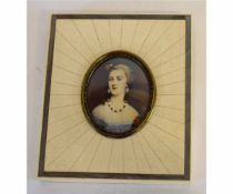 Indistinctly signed 20th century oil miniature, head and shoulders portrait of a young lady, 5cms