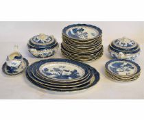 Collection of Booth's real old willow design dinner ware comprising serving dishes and plates with