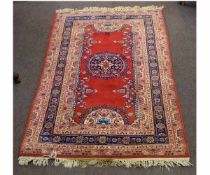 Caucasian style small rug with rust field, 152 x 94cms
