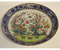 Large 19th century Cantonese famille rose charger decorated with exotic birds in a garden setting,