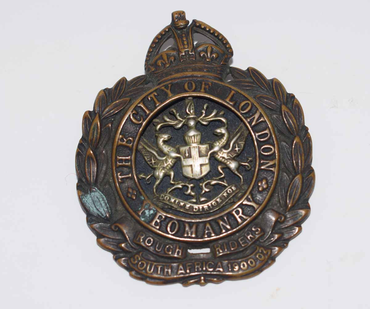Early 20th century bi-metal cap badge "The City of London Yeomanry, Rough Riders, South Africa