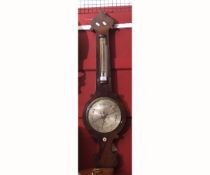 Second half of 19th century mahogany cased wheel barometer, the onion top case with plain neck and