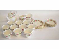 Colclough bone china tea set printed with pink and white roses to a white ground, 30 pieces in total