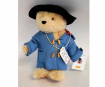 Modern Steiff Paddington Bear with a black velvet hat and blue overcoat, 34cms high