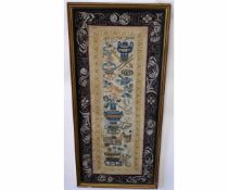 Good quality silk embroidered framed mandarin sleeve with decorative urn and floral detail, 28cms