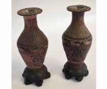 Pair of Chinese unusual woven wire work vases with a calligraphy border, each 26cms tall