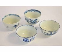 Four 18th century English porcelain teabowls including Worcester and Liverpool examples with blue