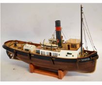 Vintage scratch built South American model boat, The Sanson, on a wooden display stand, 60cms wide x