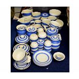 Large quantity of T G Green Cornish Ware comprising a milk jug, two flower sifters, sugar sifter,