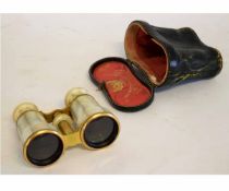 Pair of 19th century mother of pearl and gilt metal opera glasses by Bardou of Paris in a fitted