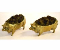 Pair of brass pig formed pin cushions, each 10cms long