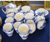 Group of Royal Doulton Norfolk pattern tea wares comprising two tea pots, 15cms tall and 13cms tall,