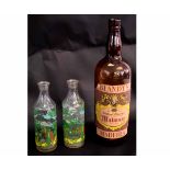 Large Blandys Madeira bottle together with two further clear glass bottles with a painted pirate