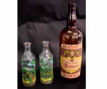 Large Blandys Madeira bottle together with two further clear glass bottles with a painted pirate
