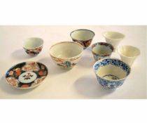 Mixed Lot: seven 19th century Chinese decorated tea bowls, together with a tea bowl and saucer in