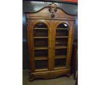 19th century French mahogany double glazed door bookcase with adjustable shelves with carved