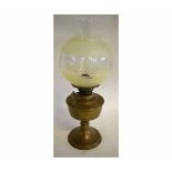 Victorian brass oil lamp with an etched green glass shade, 50cms tall