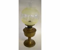 Victorian brass oil lamp with an etched green glass shade, 50cms tall