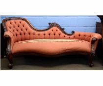 Victorian style mahogany framed chaise longue with coral upholstery and button back with squat