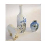Continental porcelain model of a polar bear and two Royal Copenhagen vases, the largest 24cm