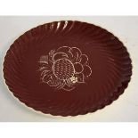 Susie Cooper large circular bowl with fluted edge, the centre with stylised floral design to a